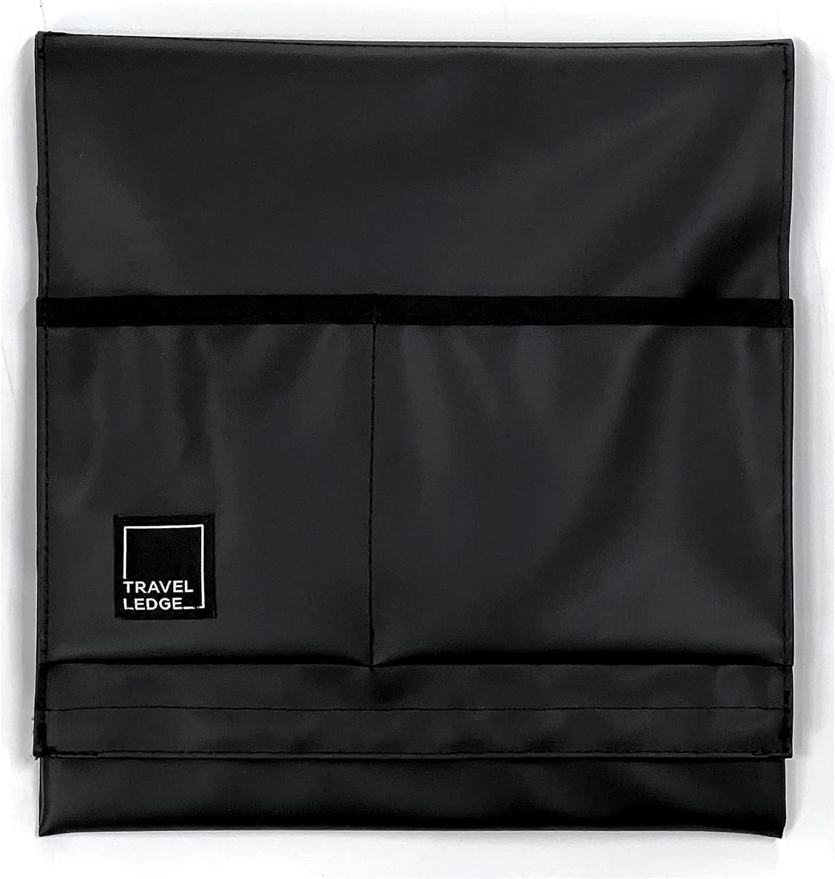 Travel Ledge folded flat with its front pockets visible